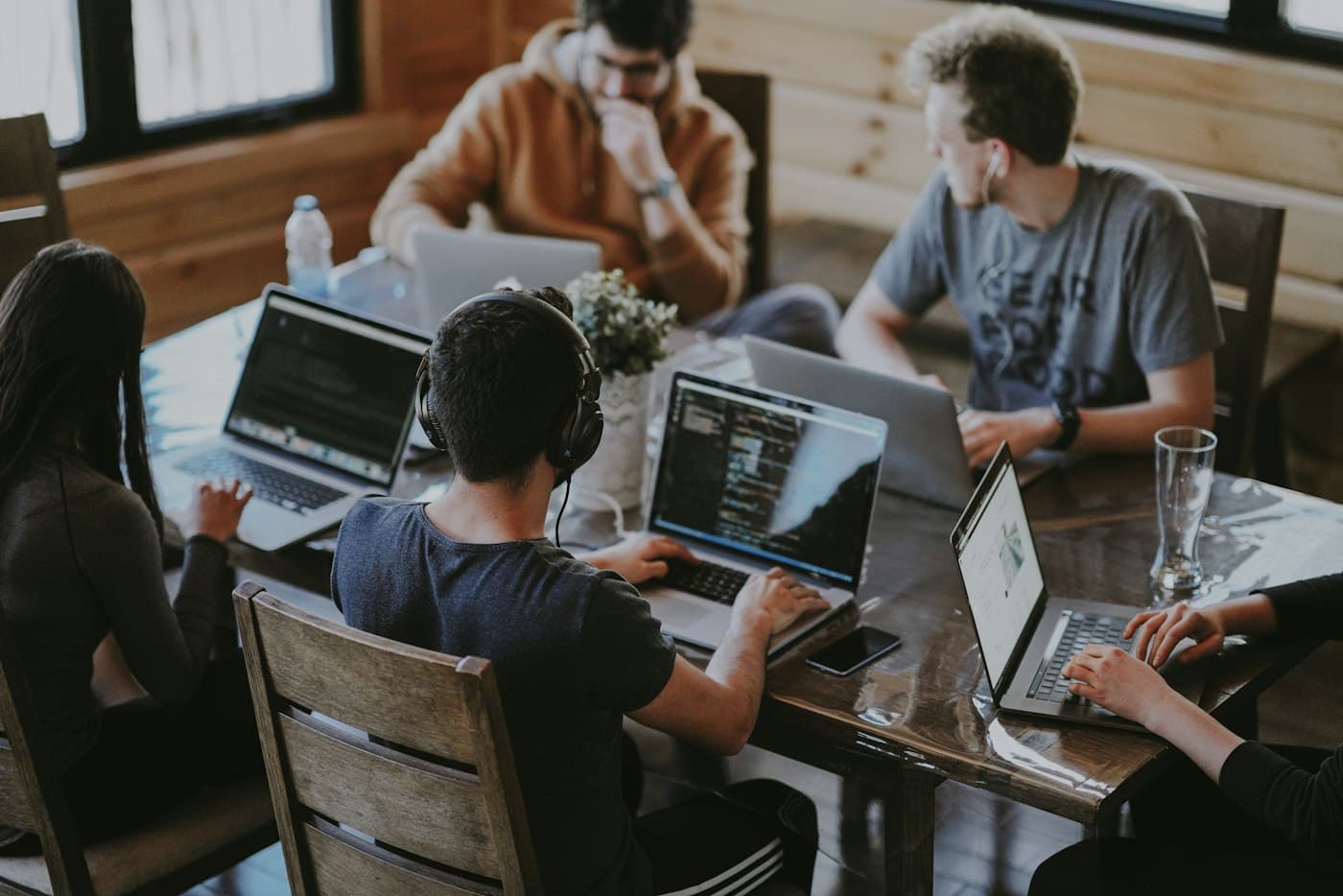Sinc Stack developers collaborating around a table
